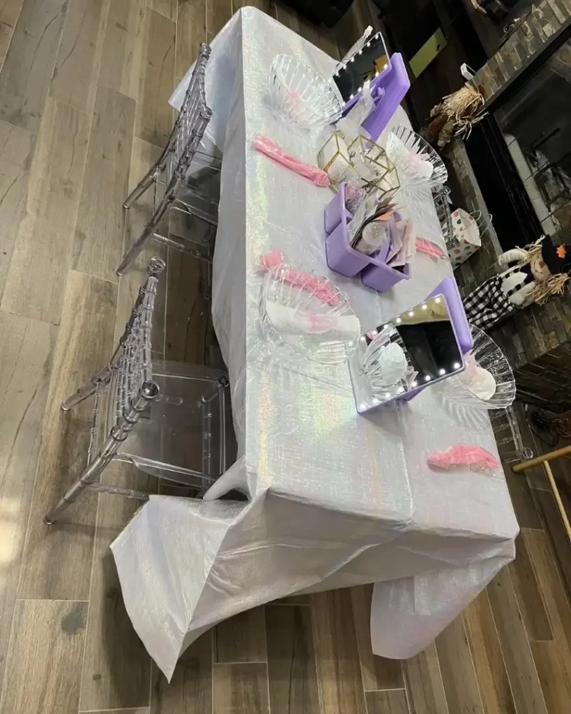 A table set up for a girl's birthday party with Texas-themed party rental decorations.